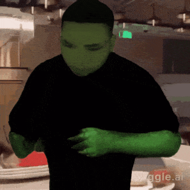 a man in a black shirt with green arms and a sign that says viggle.ai on the bottom