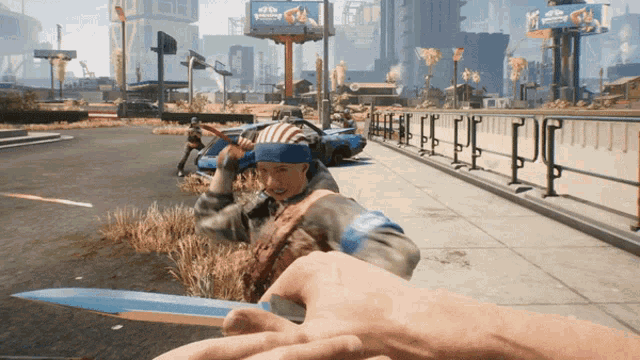 a person holding a knife in a video game with a billboard in the background that says ' coca cola '