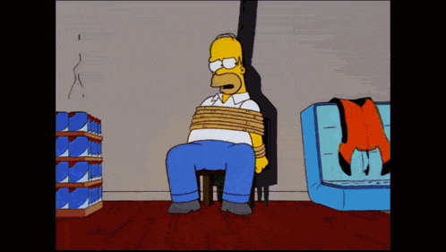 homer simpson is tied up and tied to a chair