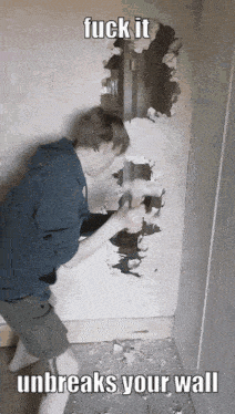 a man is hammering a hole in a wall with a caption that says " fuck it unbreaks your wall "