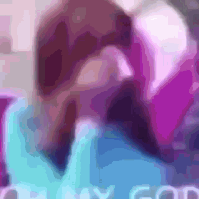 a blurry picture of a person with the words " my god " in the bottom right corner