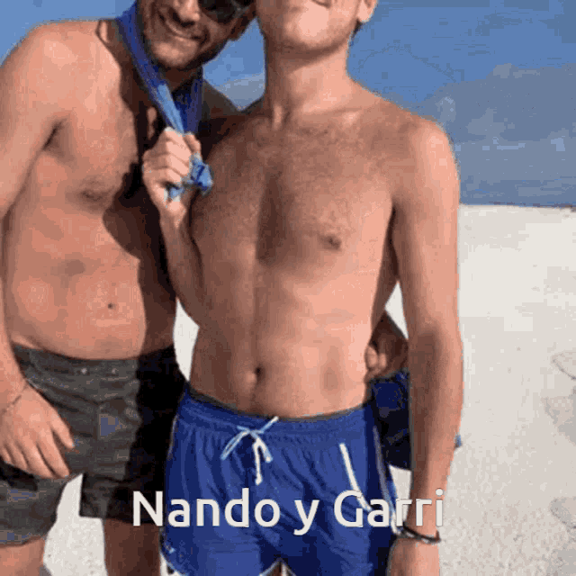 two shirtless men standing next to each other with the words nando y garri written on the bottom
