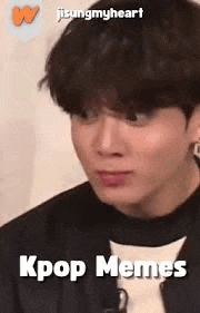 a close up of a person 's face with the words kpop memes on it .