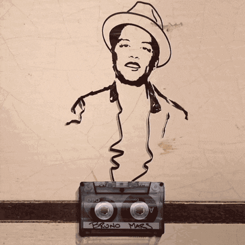 a drawing of bruno mars is on top of a cassette tape