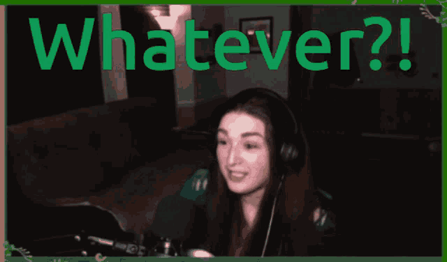 a woman wearing headphones is smiling in front of a green frame that says whatever