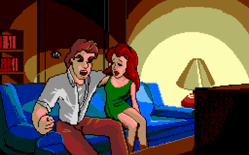 a pixel art drawing of a man and woman sitting on a blue couch