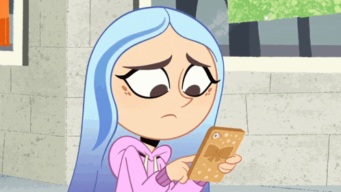 a girl with blue hair is looking at her phone