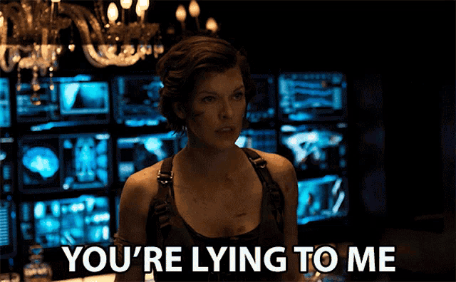 a woman says " you 're lying to me " in front of monitors