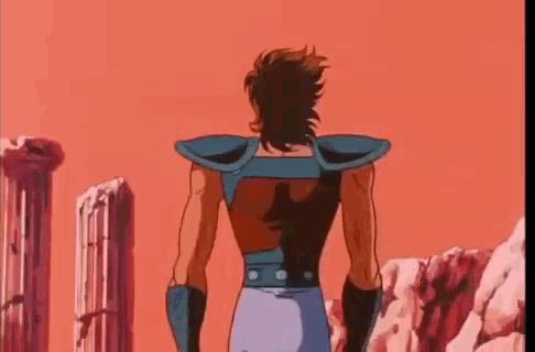 a cartoon character is standing in front of a row of columns in a desert .