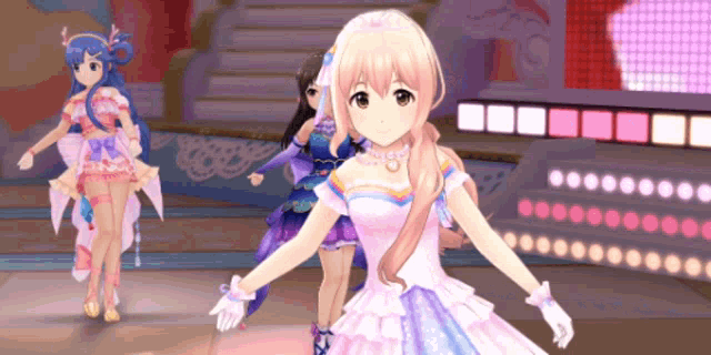 a group of anime girls are standing on a stage and one of them is wearing a white dress