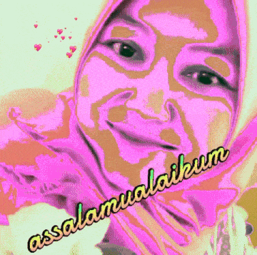 a woman wearing a pink head scarf with the words assalamualaikum written on it
