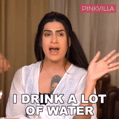 a woman says " i drink a lot of water "