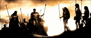 a group of warriors are standing in a line with spears and shields