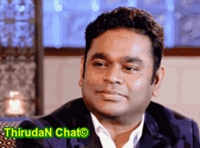 a picture of a man with the words thirudan chat on the bottom