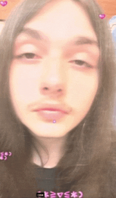 a close up of a person 's face with the letters csa on the bottom right