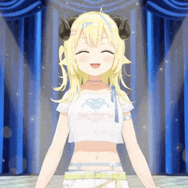 a girl with horns on her head is smiling and wearing a white shirt with a heart on it