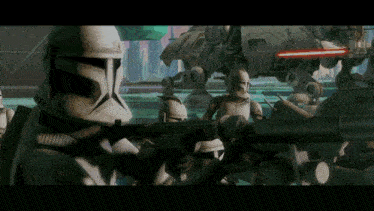 a group of clone troopers are holding guns in front of a at at walker