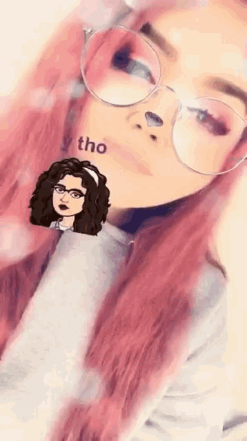 a girl with pink hair is wearing glasses and a sticker that says tho
