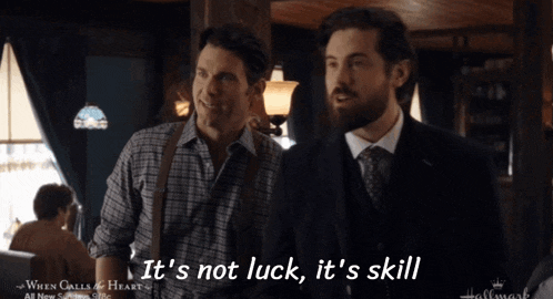 two men are standing next to each other with the words it 's not luck it 's skill