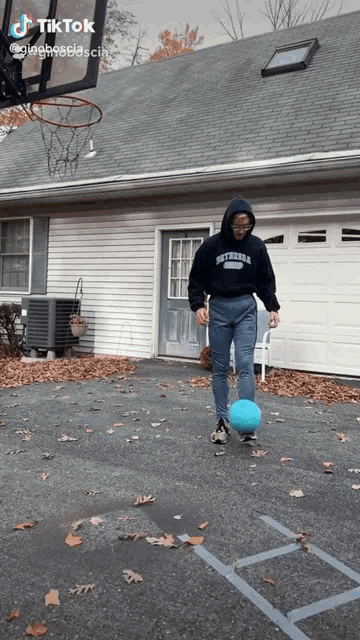 a tiktok video of a person playing basketball with a ball