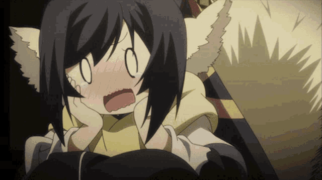 a girl with a cat ear is making a face