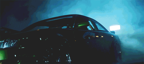 a car with smoke coming out of its tires