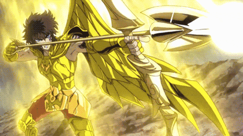 a man in a golden armor is holding a spear in his hand