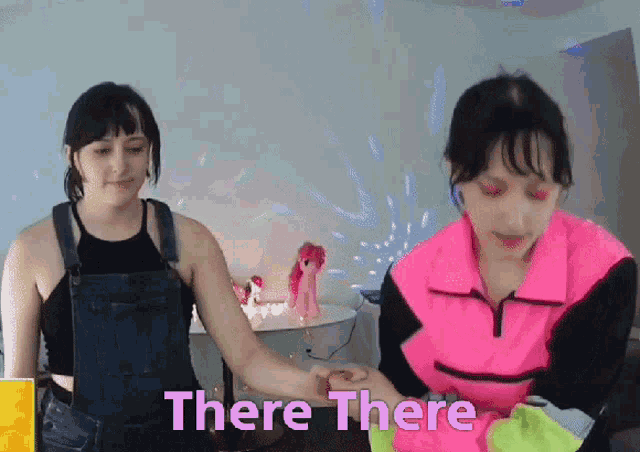 two girls holding hands with the words " there there " written on the bottom