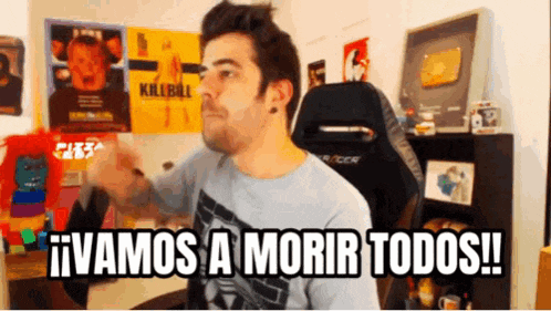 a man sitting in a chair with the words vamos a morir todos written on the bottom