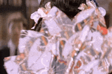 a close up of a person 's face covered in tissue paper