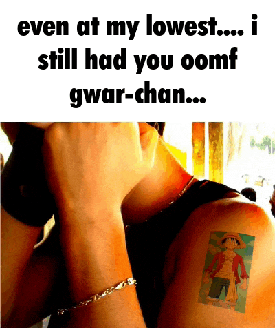 a man with a tattoo of luffy on his shoulder says even at my lowest still had you oomf gwar-chan