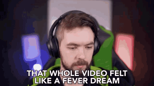 a man wearing headphones with the words that whole video felt like a fever dream