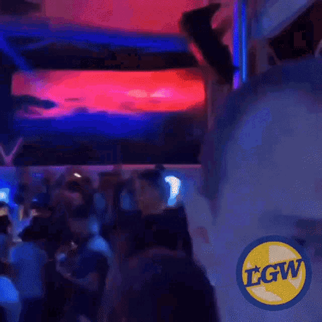 a blurry picture of a man 's face with a lgw logo in the corner