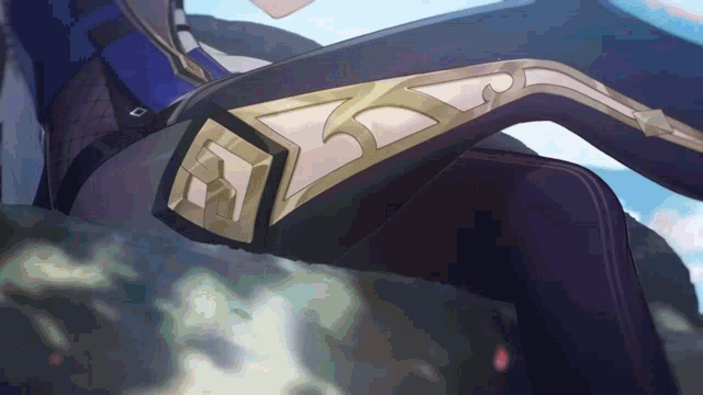 a close up of a person 's knee with a gold emblem on it