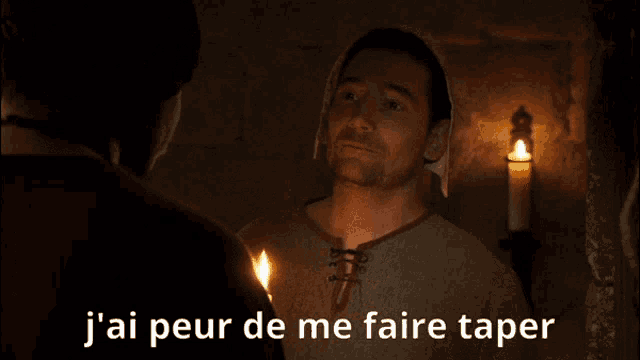 a man talking to another man with the words j ai peur de me faire taper