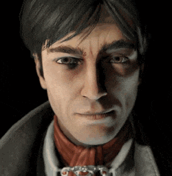 a man with a scarf around his neck is looking at the camera .