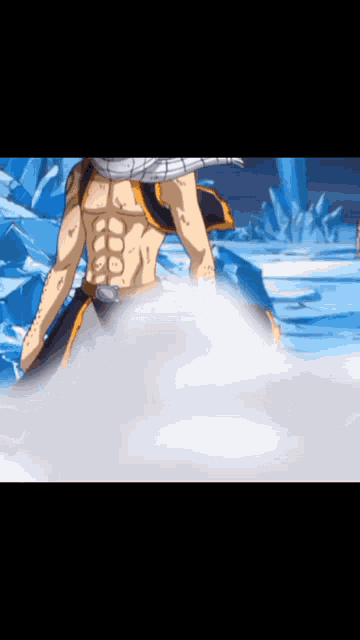 a man without a shirt is standing in the water