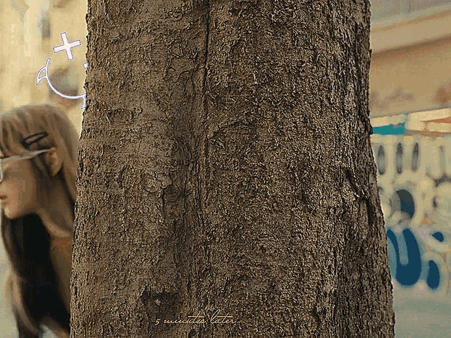a close up of a tree trunk with the words 5 minutes later written on it