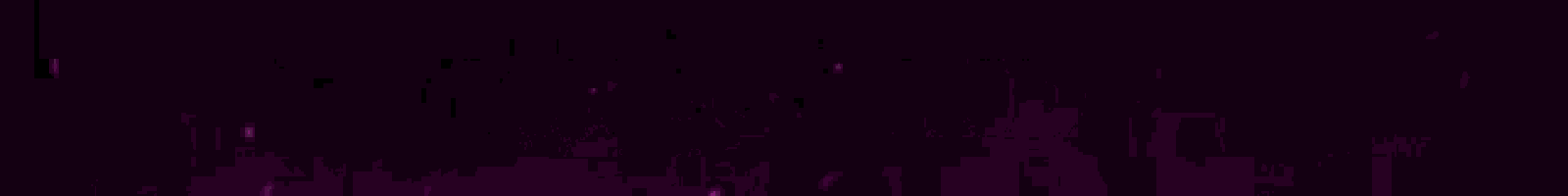 a purple and white lightning bolt on a dark background