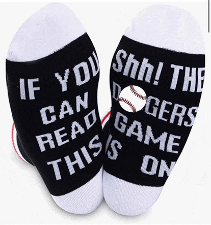 a pair of socks that say " if you can read this this is on "