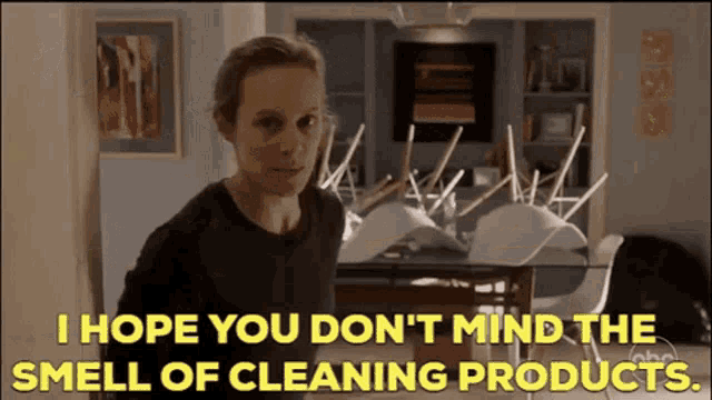 a woman says i hope you don 't mind the smell of cleaning products in a dining room