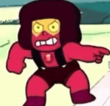 a cartoon character with a red face and yellow eyes is pointing at the camera .
