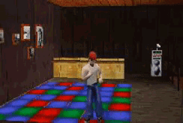 a man is dancing on a colorful dance floor