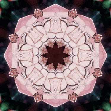 a kaleidoscope shows a circular pattern with a star in the middle