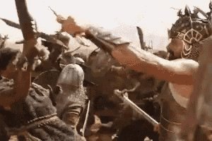 a group of warriors are fighting each other with swords in a battle .