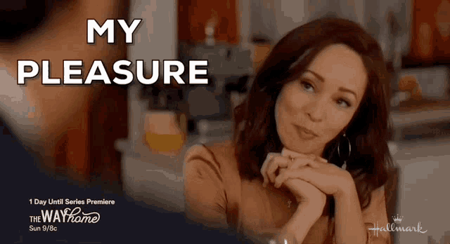 an advertisement for hallmark shows a woman sitting at a table