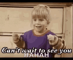 a little girl is pointing at the camera and saying `` can 't wait to see you ! ''
