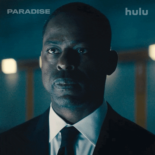a man in a suit and tie says yes i do on a hulu ad