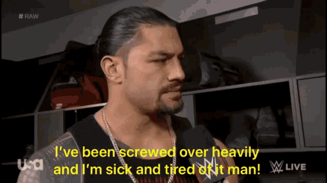 a man is talking into a microphone and says i 've been screwed