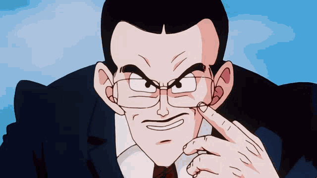 a man in a suit and tie is pointing his finger at his face